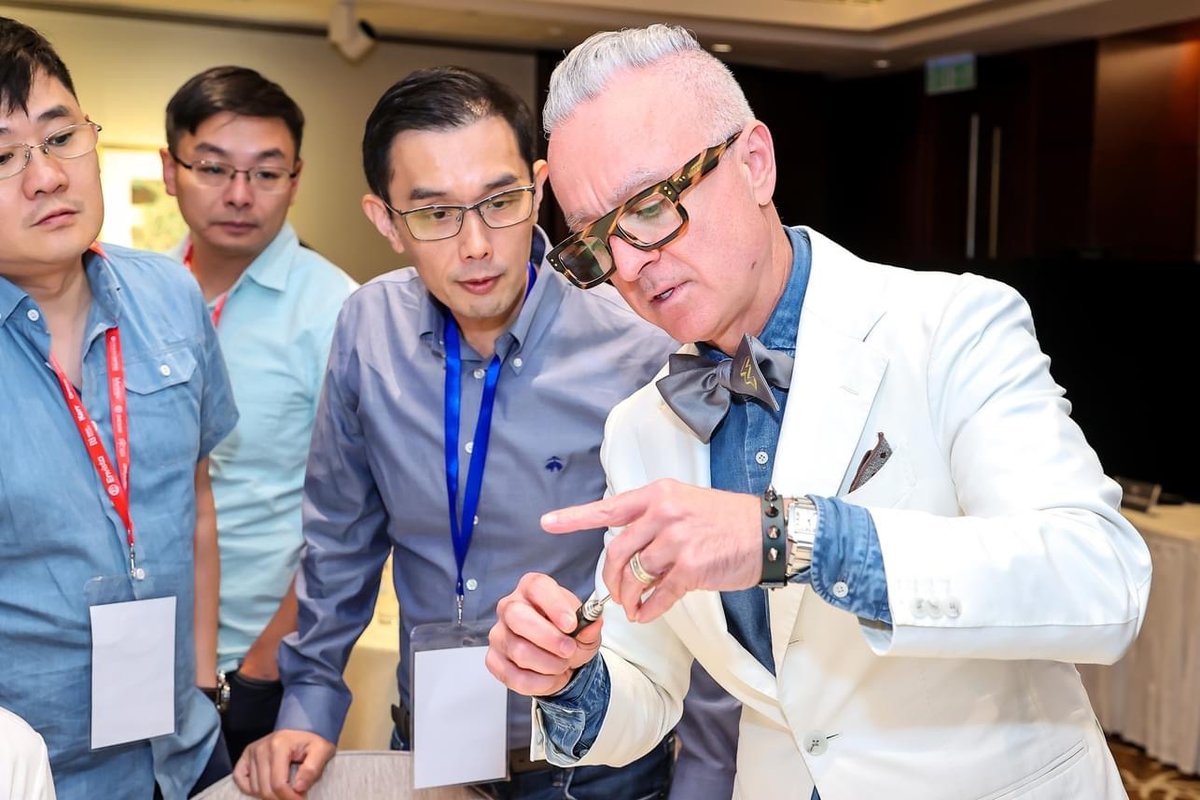 Dr. Joe Mehranfar leading a hands-on small-group implant training